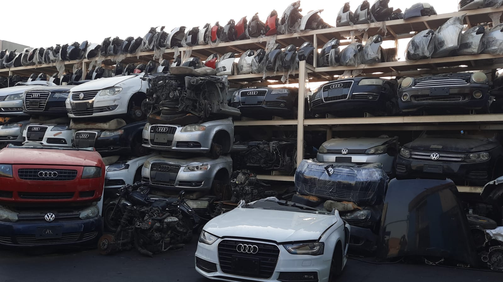 Audi front end and body panels stored on racks at Wales Car Parts, Cwmbran