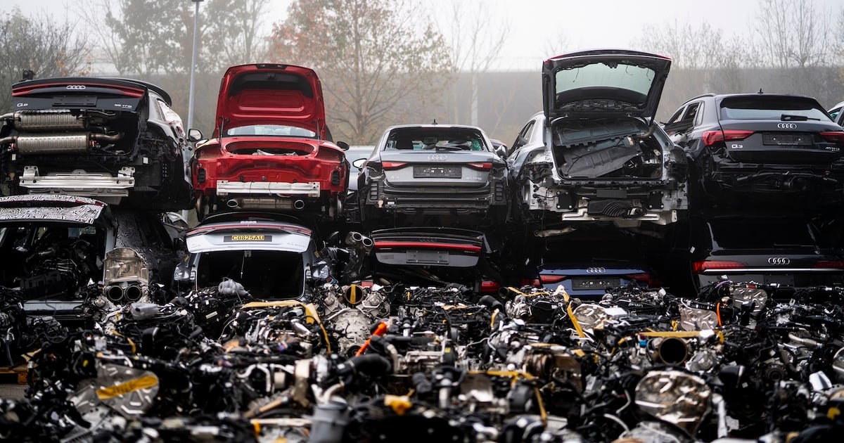 Our Audi breaker yard with dismantled cars and engines in the foreground
